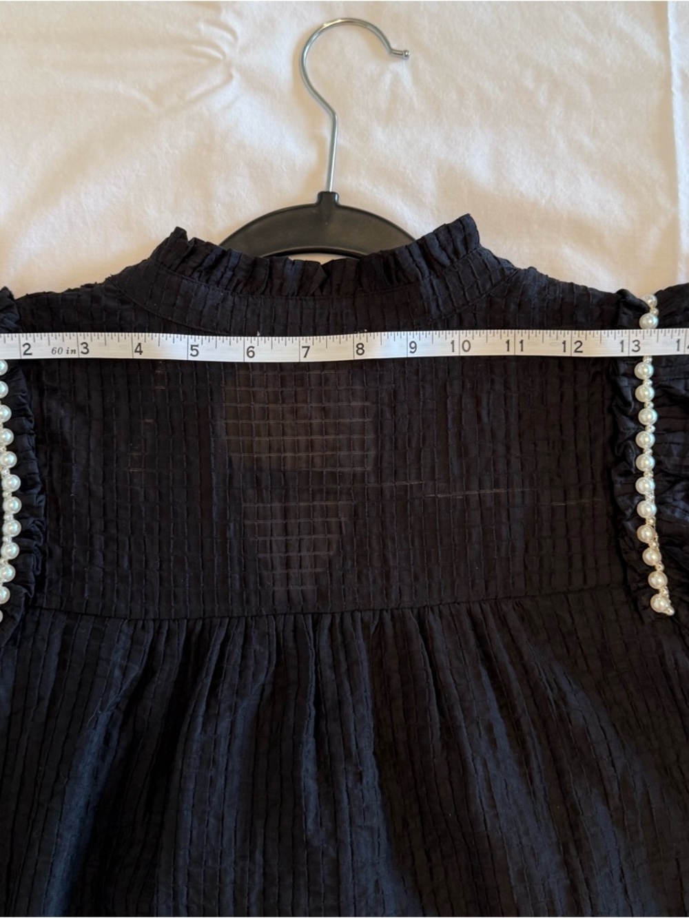 Feminine flowy top from Entro.  Black Ruffle Sleeve Blouse with Pearl Trim - Picture 9 of 14